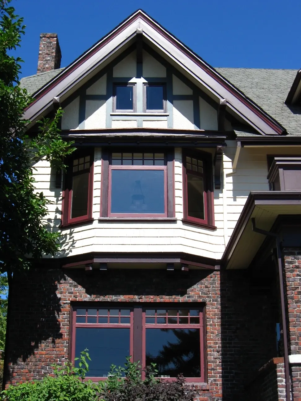 Historic Craftsman bay window detail with custom wood sash
