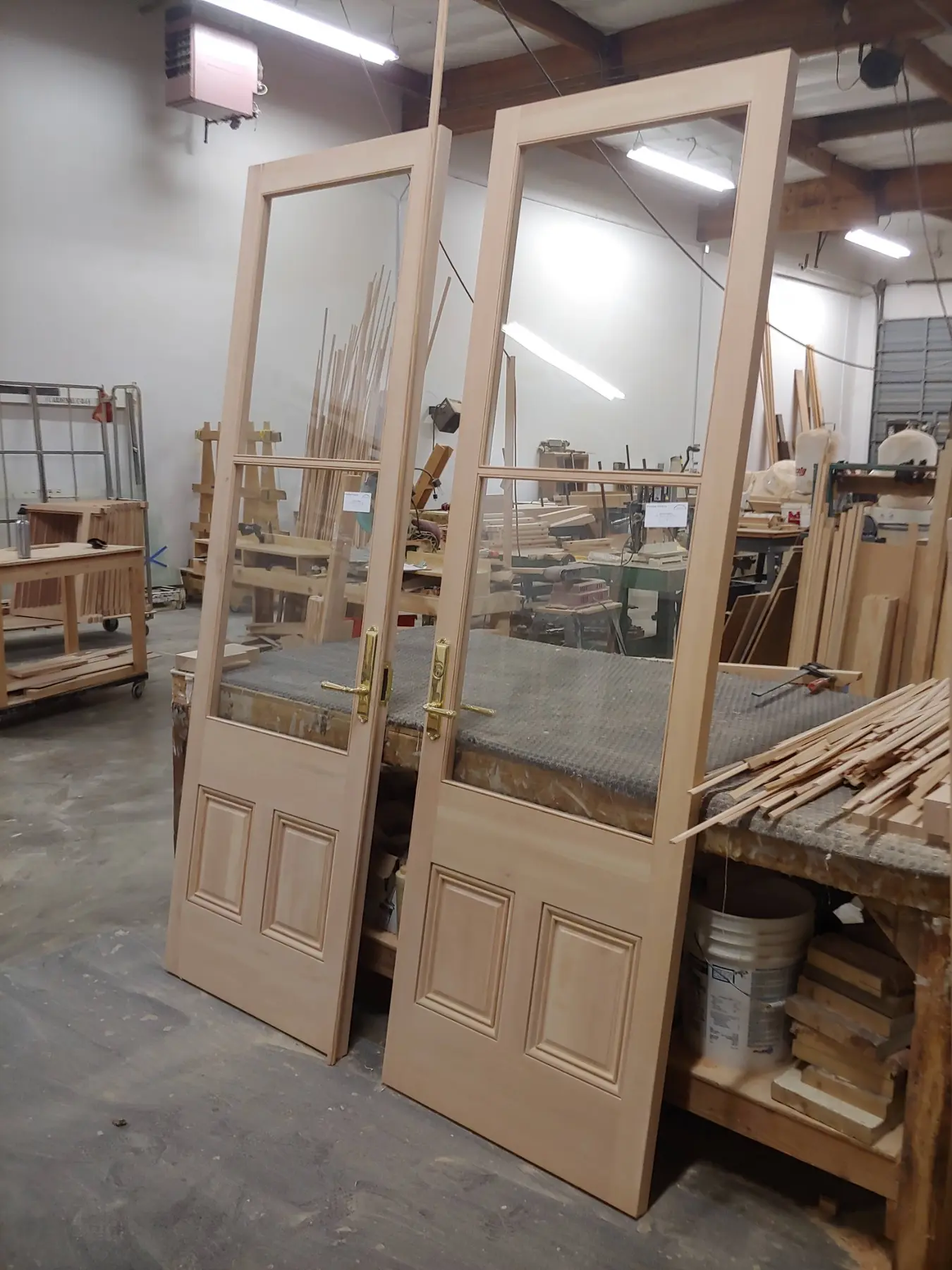 Pair of custom wood doors being fabricated in the Wooddale workshop