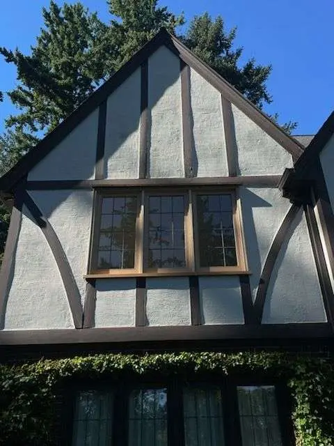 Historic Tudor-style Portland home with wood windows