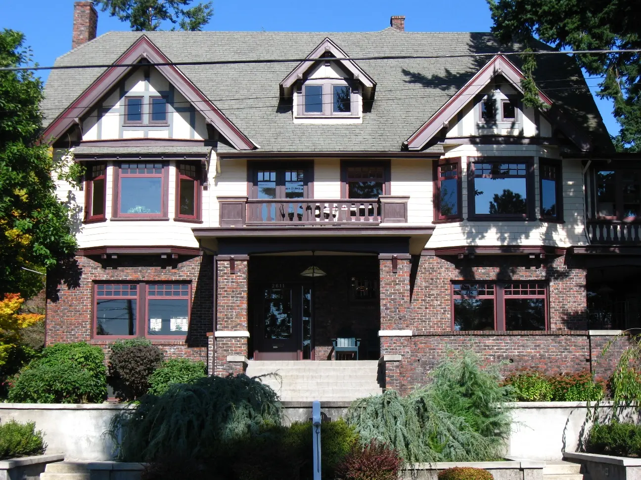 Historic Portland home with Tudor detailing and wood-framed windows